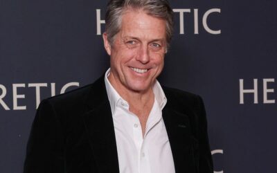 ‘Steady on’: Hugh Grant addresses rumours he had a steamy make-out session with a reality star