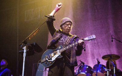 Neil Young back on at the Glastonbury music festival, citing ‘an error in the information received’