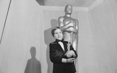 The dark truth behind this history-making photo of the youngest ever Oscar recipient, actress Tatum O’Neal